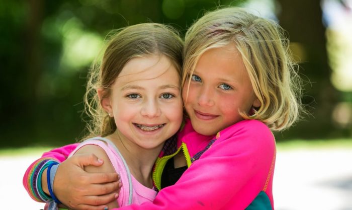 Two cute girls smiling