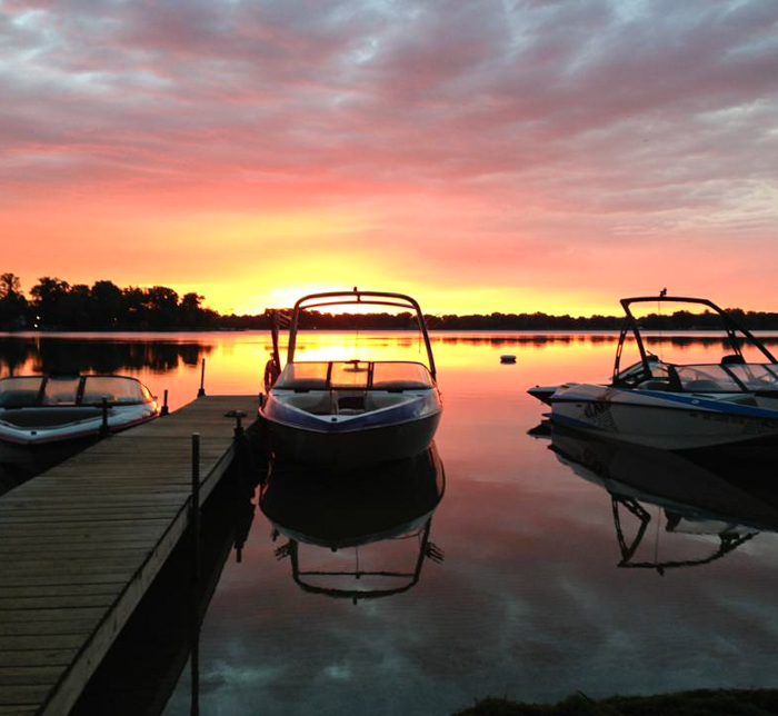 Boats on the lake at sunset